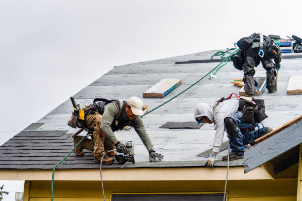 Professional Roofing technician working in Burton, MI